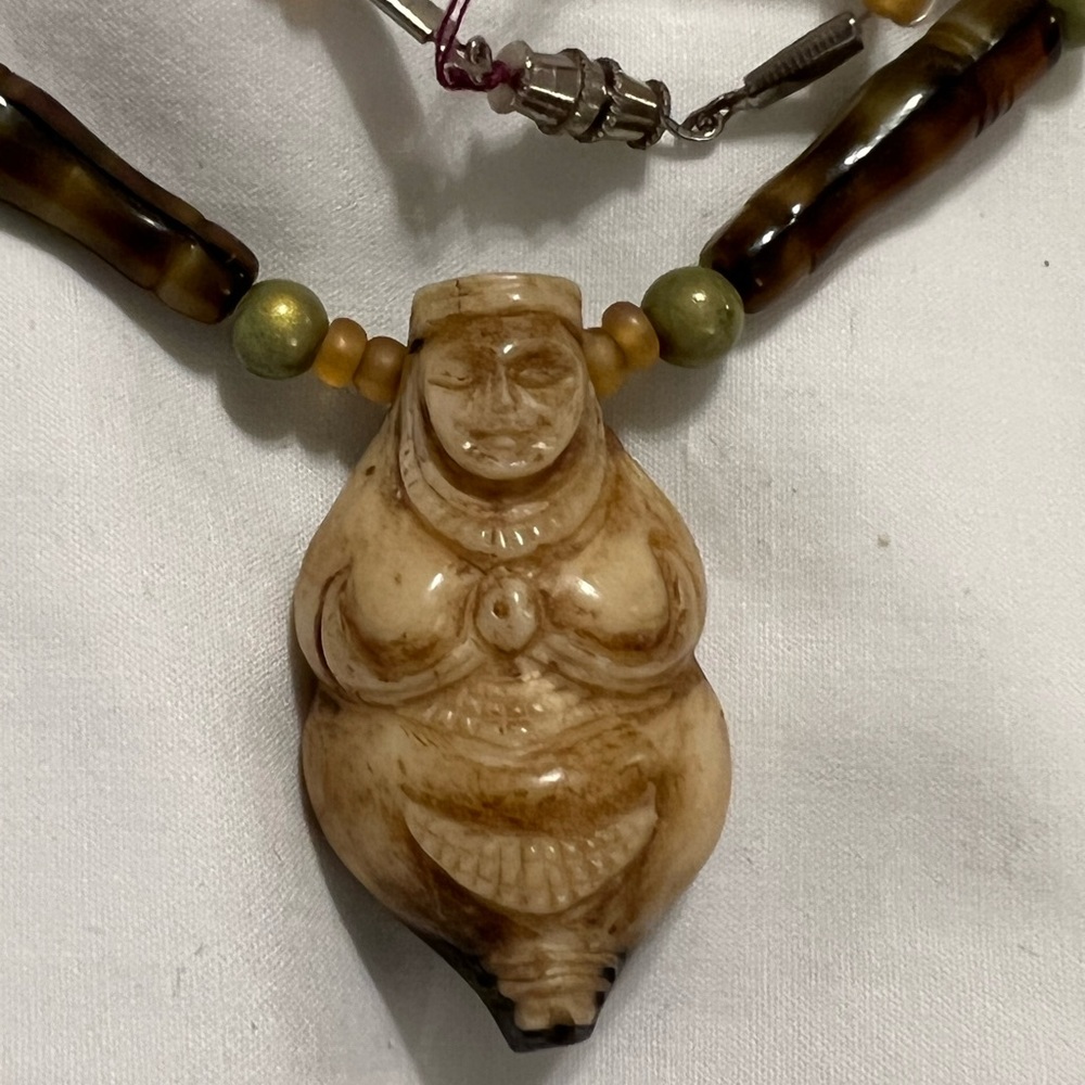 Tribal-native pendant necklace.